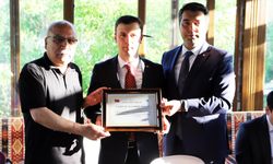 Kaymakam Kaya’ya “Fahri Hemşehrilik Beratı” verildi