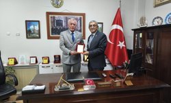 Müfit Göçen’den Murat Sürmeli’ye 49. Yıl Plaketi