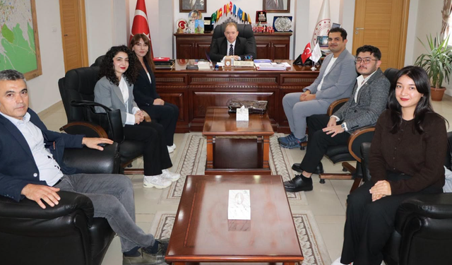 KAEÜ Akademisyenlerinden İl Millî Eğitim Müdürü Gülşen’e Teşekkür Ziyareti
